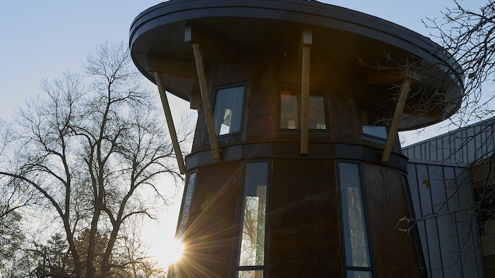 Drum Room Exterior Morning light gleams beyond the exterior of American Indian Hall's drum room.