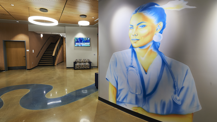 Portrait of a Native American Nurse A mural by Wyoming artist Robert Martinez, Northern Arapaho, depicts a Native nurse in this colorful rendering inside MSU’s American Indian Hall.