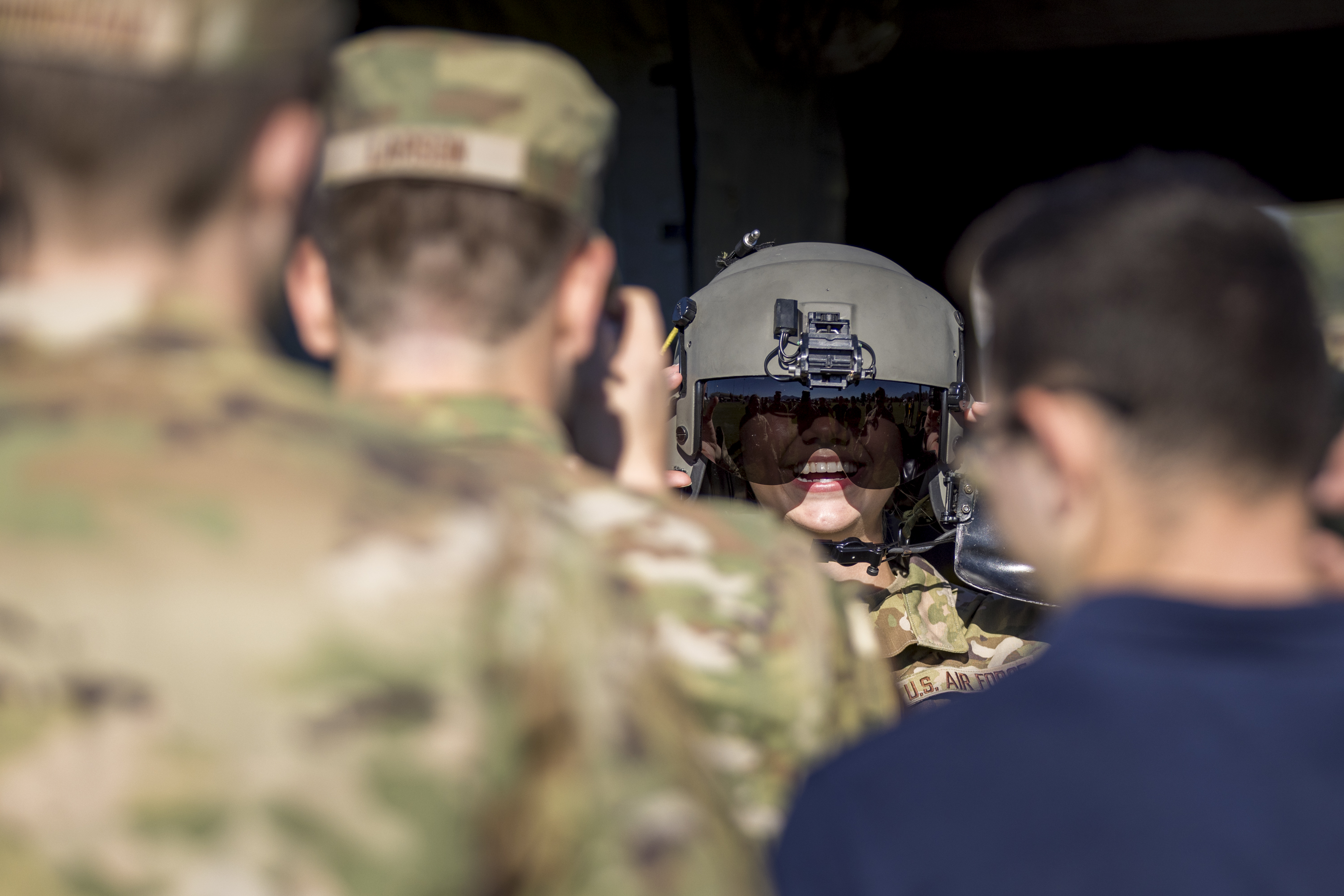 AFROTC Cadet trying on aircrew helmet AFROTC Cadet trying on aircrew helmet