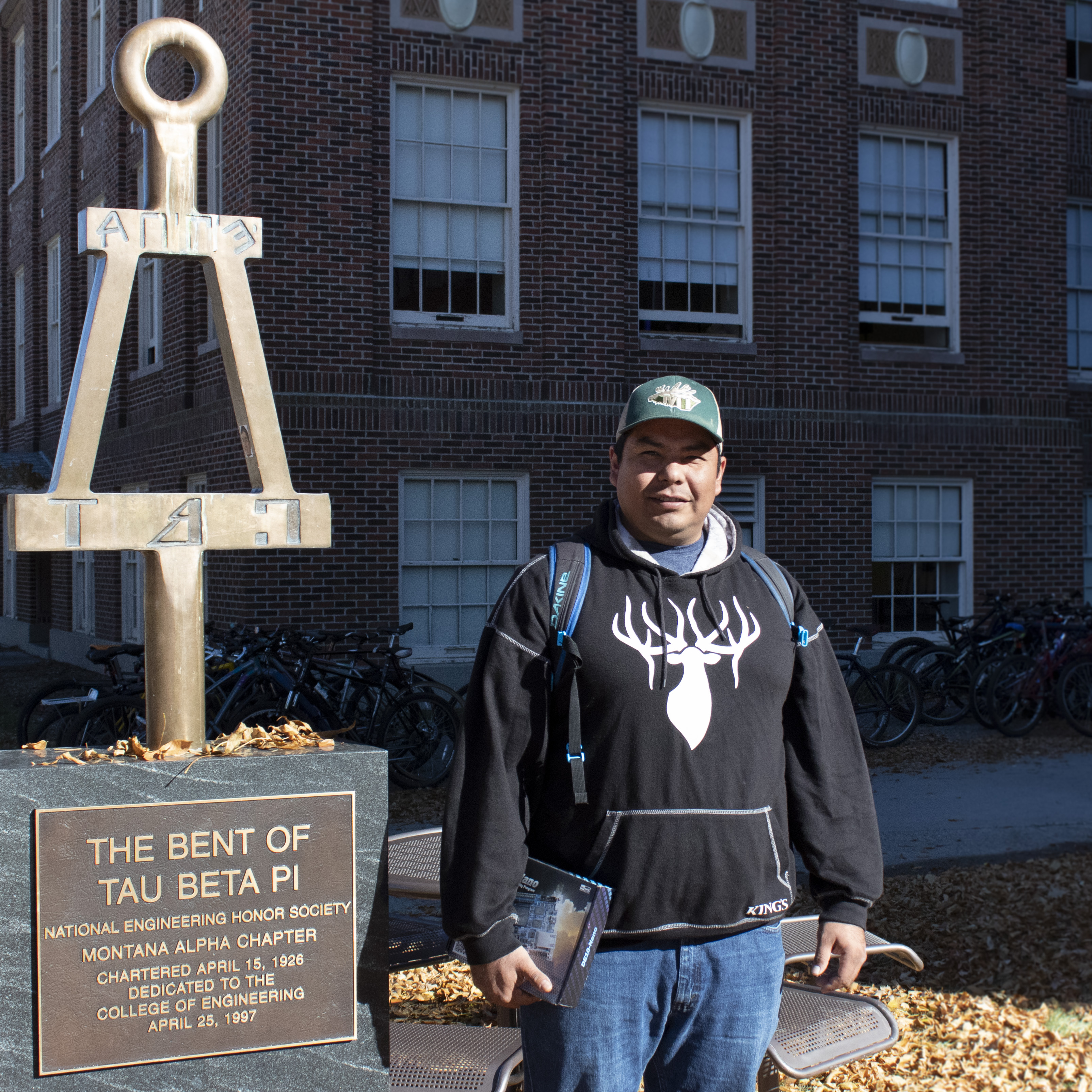 Randall A picture of Randall beside the bent of tau beta phi