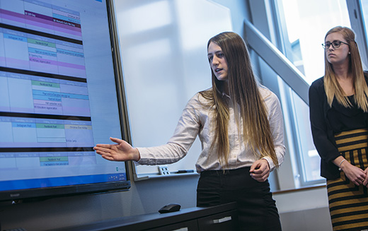 Student consultants presenting to client