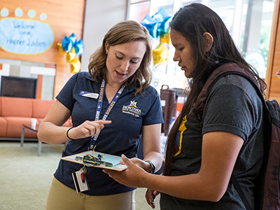 Montana State University student employee working in a Campus Residence Hall