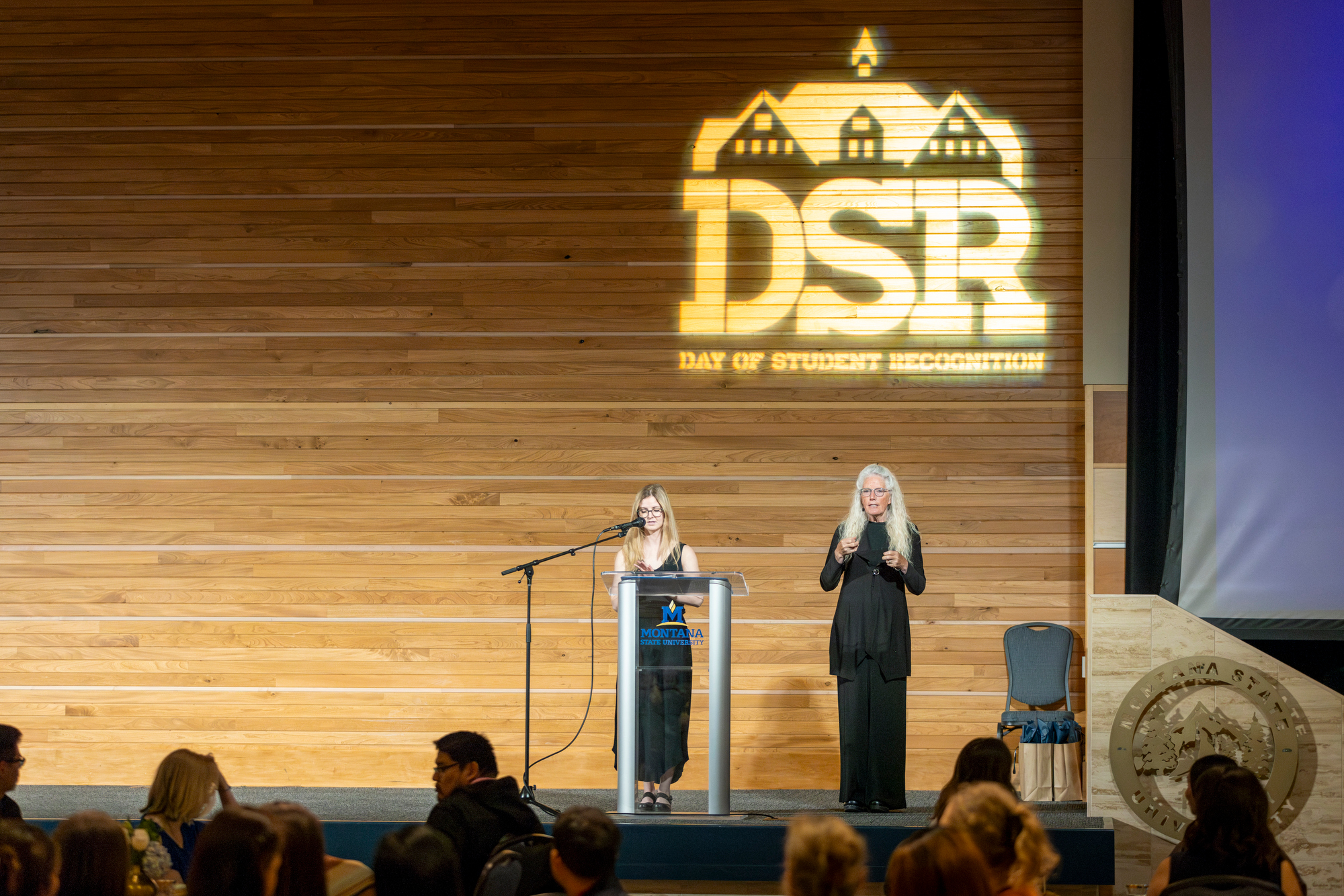 Presenter on Stage for Day of Student Recognition Awards Ceremony