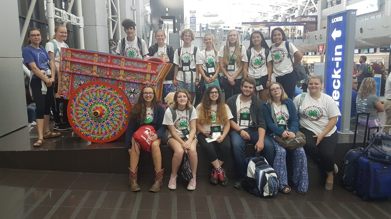 Costa Rica Delegates Traveling Home Costa Rica Delegates at the airport in States 4-H t-shirts
