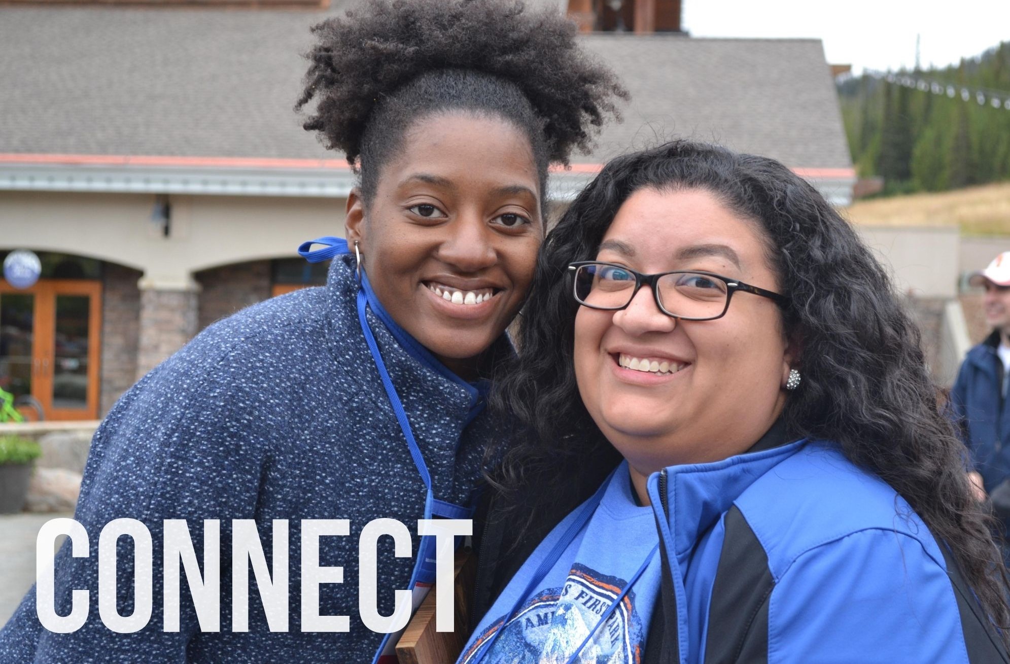 Connect Text: Connect. A female volunteer and club member smile.