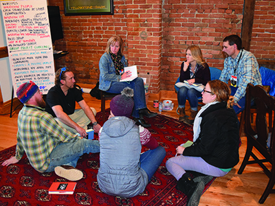 Leadership discussion group. Group of people discussing leadership strategies.