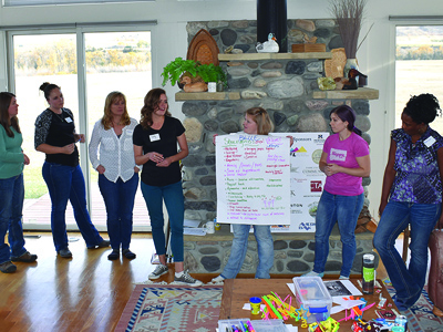 Women at training seminar. Group of women discussing ideas at training seminar.