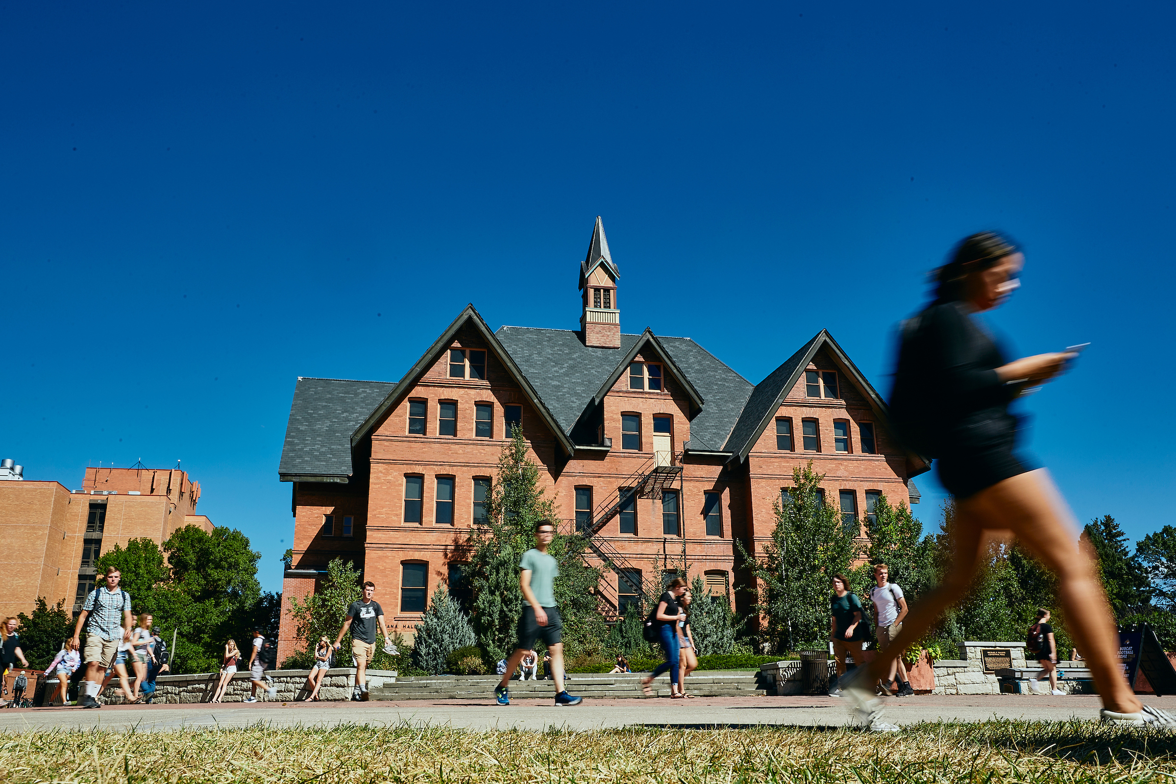 transcripts students on Mall walking past Montana Hall